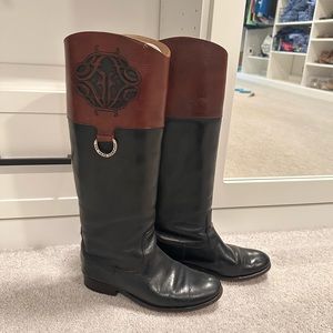 Frye Boots. Black and brown- Melissa logo. I also have the original box.